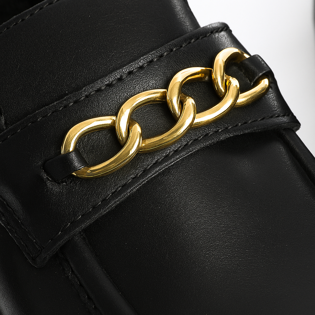 Comfortable black leather loafers with bold chain design and chunky sole