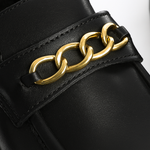 Comfortable black leather loafers with bold chain design and chunky sole