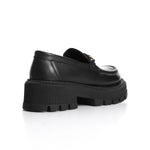 Comfortable black leather loafers with bold chain design and chunky sole