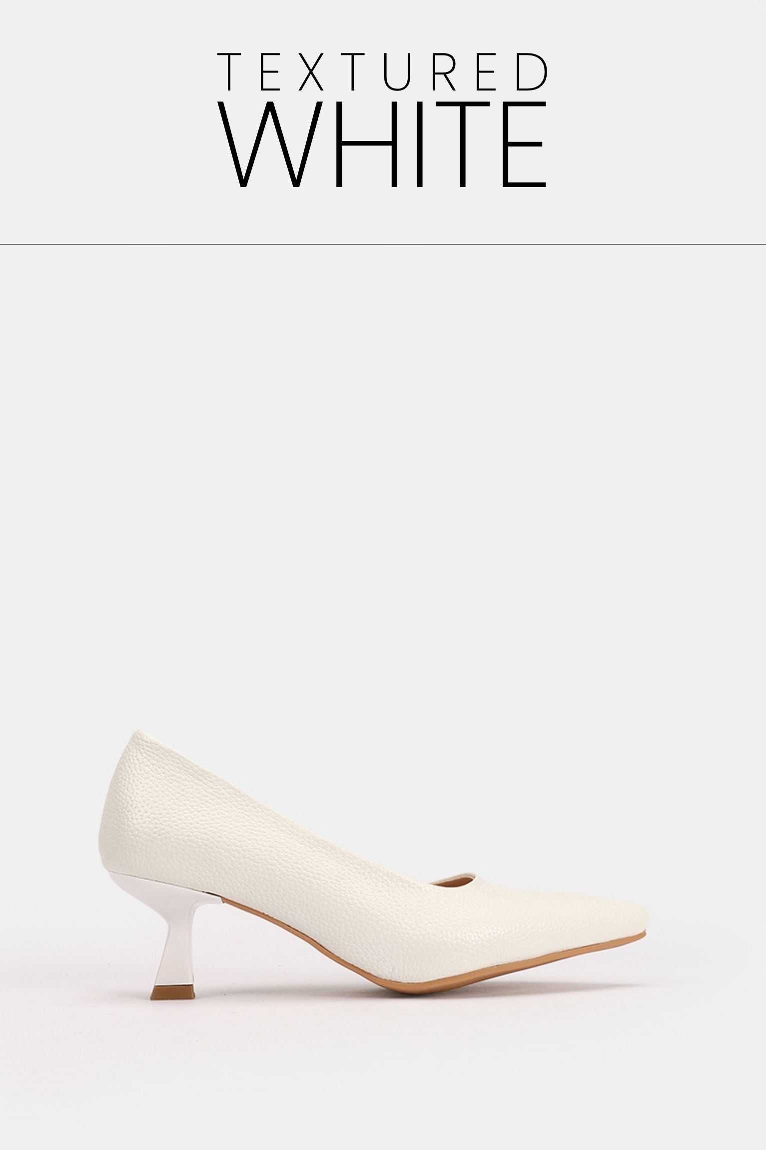Pointed toe white textured kitten heels